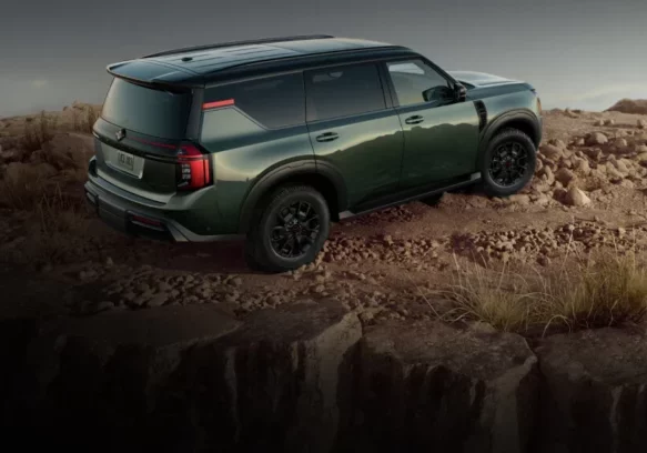 2025-nissan-armada-green-highlighting-rugged-off-road-capabilities